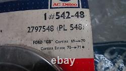 Mk2 Ford Cortina Nos Ac Delco Locking Fuel Filler Cap translates to 'Bouchon de remplissage de carburant verrouillable Ac Delco pour Mk2 Ford Cortina' in French.